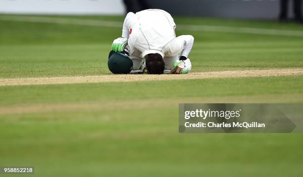 Imam ul-Haq of Pakistan kisses the ground after scoring the winning run on the fifth day of the international test cricket match between Ireland and...