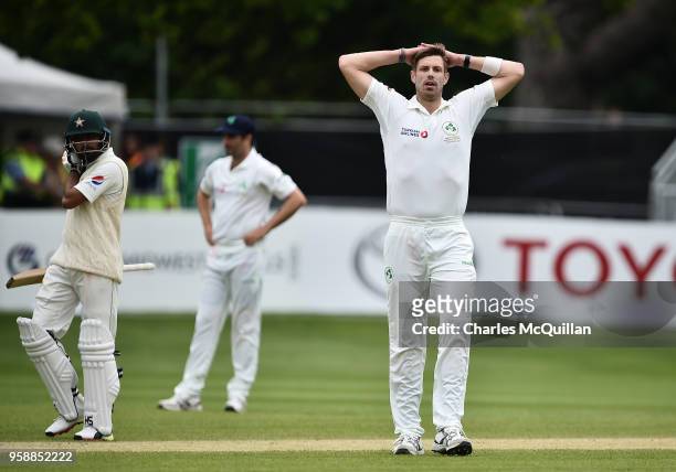 Boyd Rankin of Ireland reacts to Imam ul-Haq's boundary during the fifth day of the international test cricket match between Ireland and Pakistan on...
