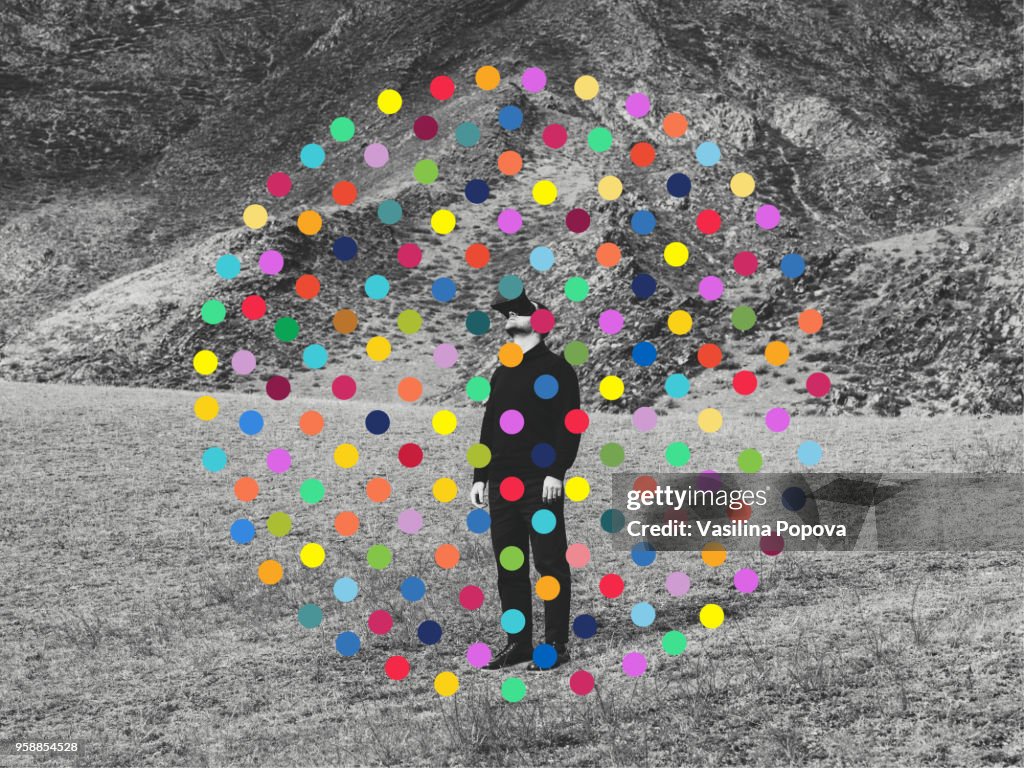 Man wearing virtual reality headset against nature background
