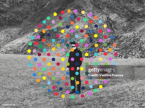 man wearing virtual reality headset against nature background - black and white photo to colour stock pictures, royalty-free photos & images