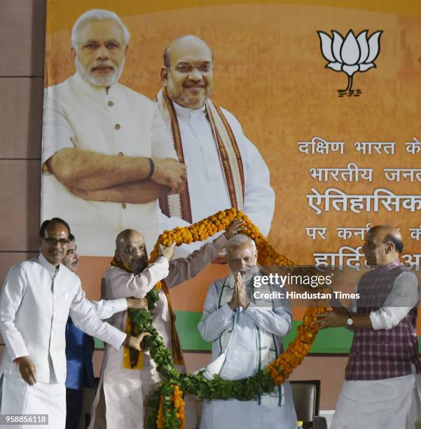 President Amit Shah, Union Minister Rajnath Singh, Madhya Pradesh Chief Minister Shivraj Singh Chouhan and Minister of Road Transport and Highways...