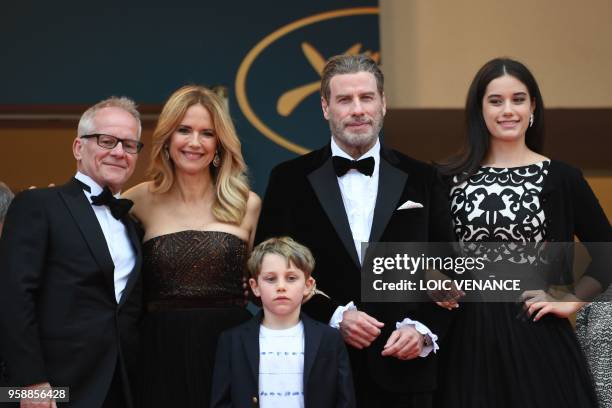 Actor John Travolta , his wife US actress Kelly Preston and children Ella Bleu Travolta and Benjamin Travolta pose with the General Delegate of the...