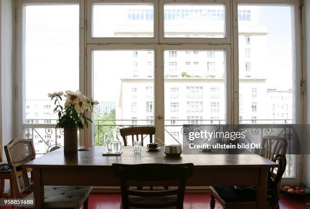 Germany - Berlin - Friedrichshain : dining table in front of a panorama window in the building "haus des Kindes" at Strausberger Platz