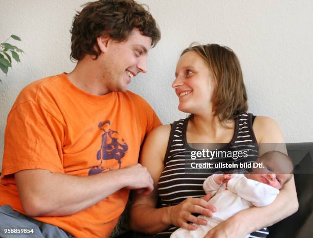 Young couple with baby -