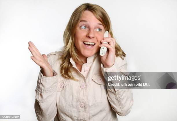 Young woman with a telephone -