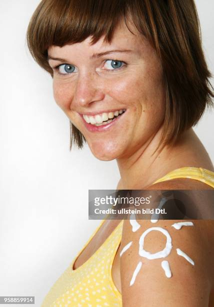 Germany; young woman with sunscreen - 2007