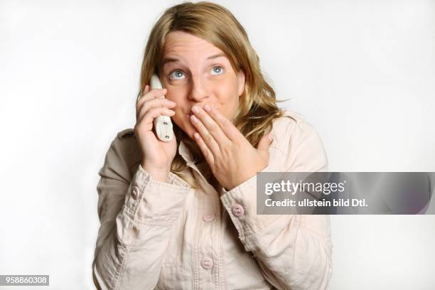 Young woman with a telephone -