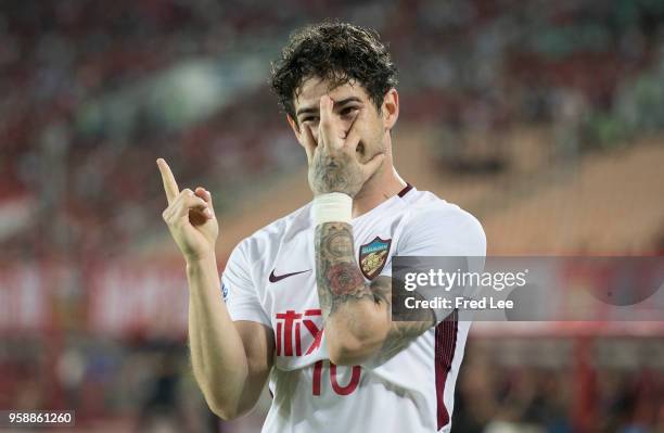 Alexandre Pato of Tianjin Quanjian celebrates after scoring his team's first goal during the AFC Champions League Round of 16 second leg match...