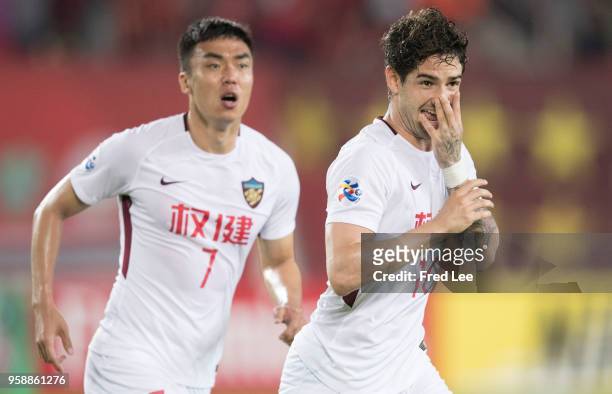 Alexandre Pato of Tianjin Quanjian celebrates after scoring his team's first goal during the AFC Champions League Round of 16 second leg match...