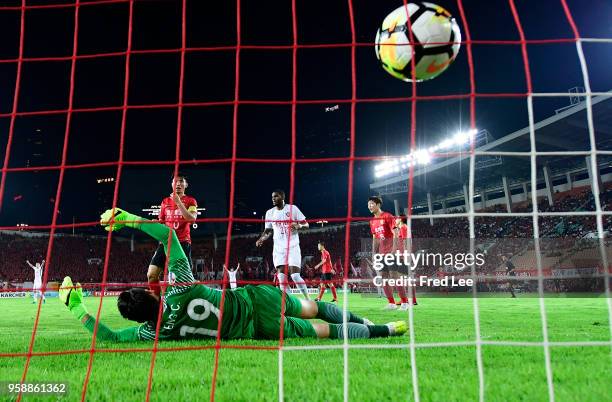 Alexandre Pato of Tianjin Quanjian scores his team's first goal during the AFC Champions League Round of 16 second leg match between Guangzhou...