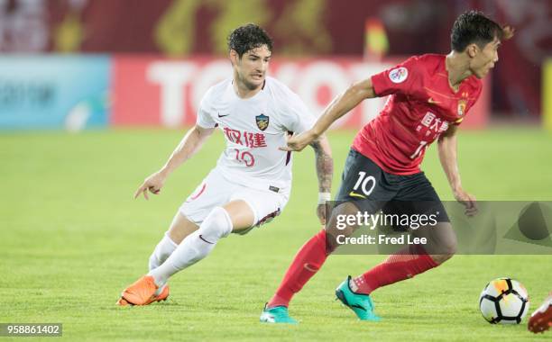 Alexandre Pato of Tianjin Quanjian and Zheng zhi Mi Haolun of Tianjin Quanjian and Zhang linpeng of in action during the AFC Champions League Round...