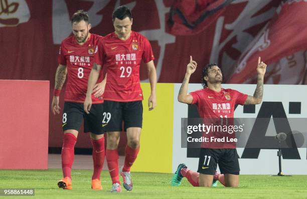 Ricardo Goulart of Guangzhou Evergrande celebrates after scoring his team's first goal during the AFC Champions League Round of 16 second leg match...