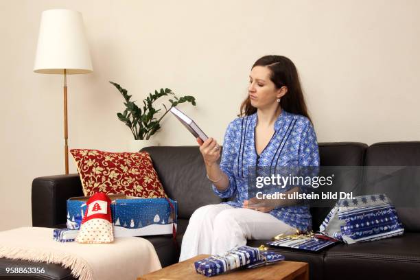 Germany - a woman with christmas presents -