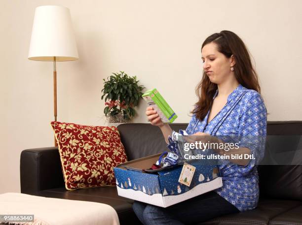 Germany - a woman with christmas presents -