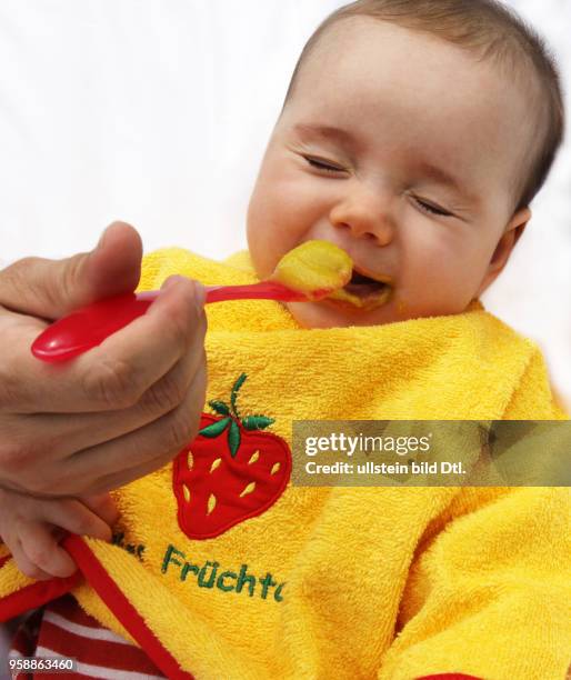 Germany - feeding a baby -