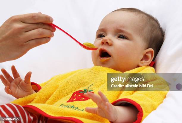 Germany - feeding a baby -