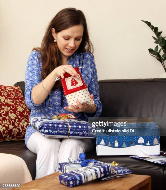 Germany - a woman with christmas presents -