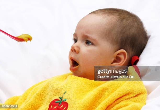 Germany - feeding a baby -