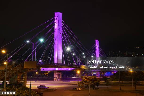 puente gilberto echeverri mejía in purple colour, night, long exposure, medellin, colombia - medellin colombia imagens e fotografias de stock