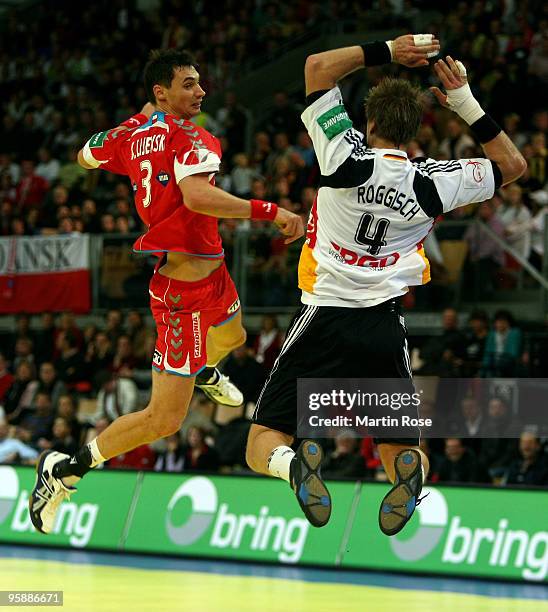 Krysztof Lijewski of Poland throws the ball during the Men's Handball European Championship Group C match between Germany and Poland at the Olympia...