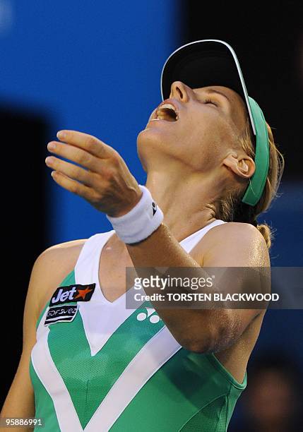 Elena Dementieva of Russia reacts while playing against Justine Henin of Belgium in their women's singles second round match on day three of the...