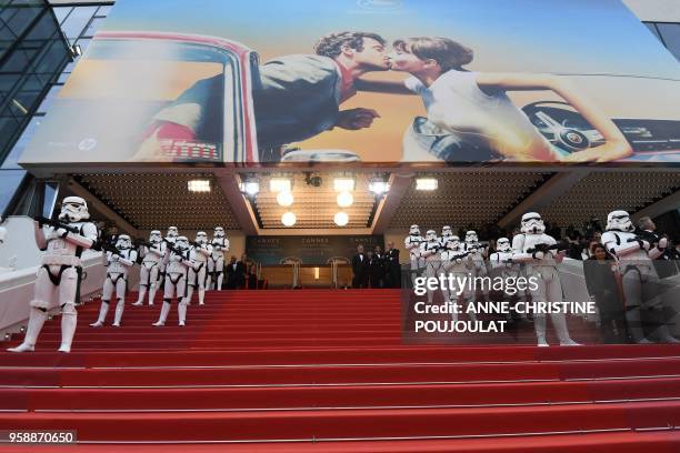 Star Wars stormtroopers pose on the red carpet as cast members arrive on May 15, 2018 for the screening of the film "Solo : A Star Wars Story" at the...