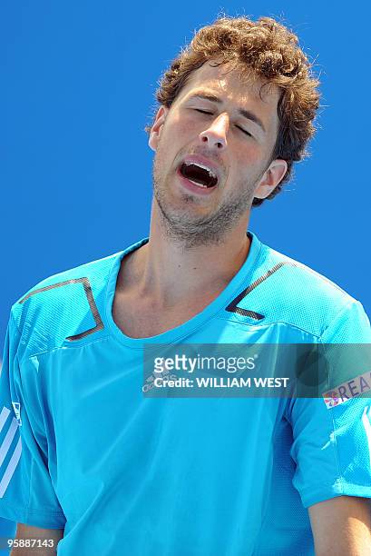 Robin Haase of the Netherlands reacts during his loss to Tomas Berdych of the Czech Republic in their men's singles first round match on day one of...