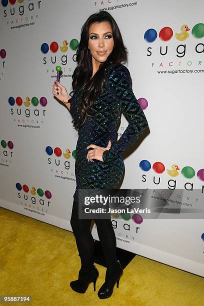 Kim Kardashian attends the launch of Mel B's Sugar Factory Couture Lollipop series at Guys and Dolls Lounge on January 19, 2010 in Los Angeles,...