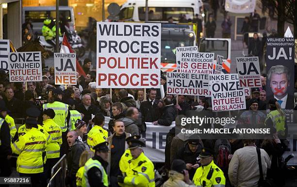 Sympathizers of right-wing Dutch MP Geert Wilders demonstrate in front of the Amsterdam court on January 20, 2010. Dutch far-right lawmaker Geert...