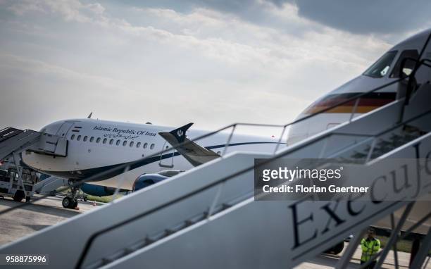 The german government plane is pictured in front of the government plane of Iran on May 15, 2018 in Brussels, Belgium. German Foreign Minister Heiko...