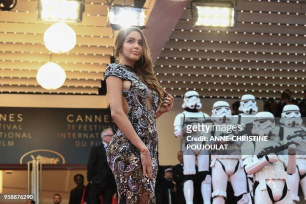 French-Swiss model Nabilla Benattia poses as she arrives on May 15, 2018 for the screening of the film "Solo : A Star Wars Story" at the 71st edition...