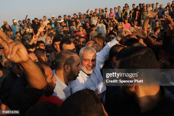 Hamas leader Ismail Haniya greets protesters at the border fence with Israel on May 15, 2018 in Gaza City, Gaza. Israeli soldiers killed over 50...