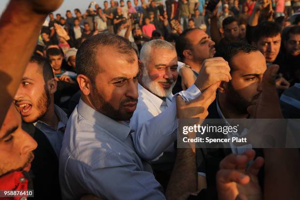 Hamas leader Ismail Haniya greets protesters at the border fence with Israel on May 15, 2018 in Gaza City, Gaza. Israeli soldiers killed over 50...