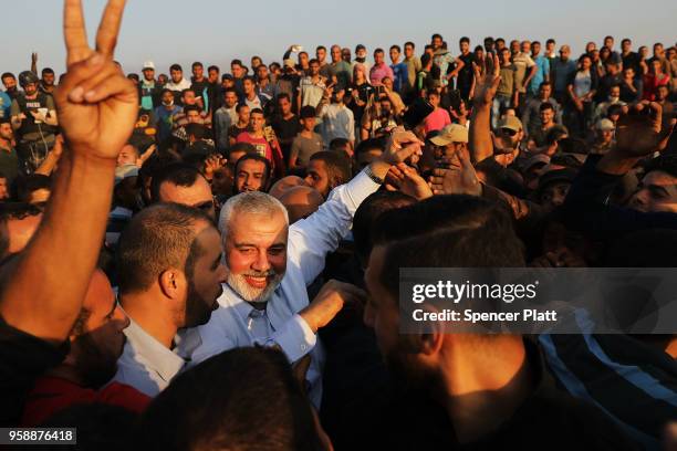 Hamas leader Ismail Haniya greets protesters at the border fence with Israel on May 15, 2018 in Gaza City, Gaza. Israeli soldiers killed over 50...