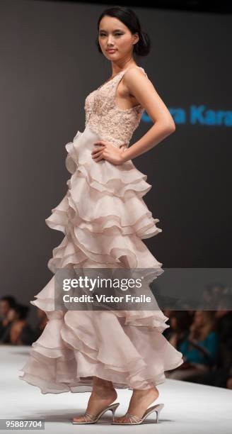 Model showcases designs by Cara Kara on the catwalk during the International Fashion Designers' Show I as part of the Hong Kong Fashion Week...