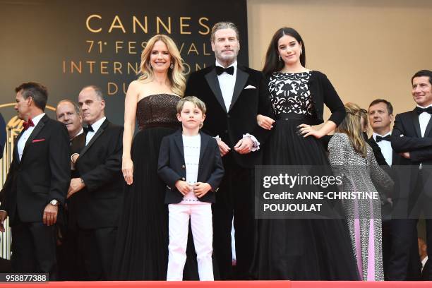 Actor John Travolta , his wife US actress Kelly Preston and their children Ella Bleu Travolta and Benjamin Travolta pose as they arrive on May 15,...
