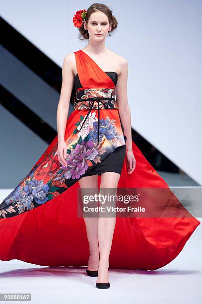 Model showcases designs by Naoko Tsuruta of Japan on the catwalk during the International Fashion Designers' Show I as part of the Hong Kong Fashion...