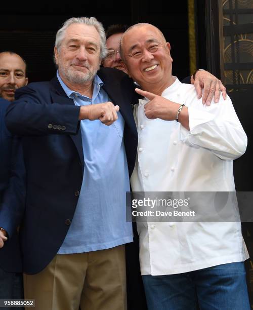Robert De Niro and Nobu Matsuhisa pose after the opening ceremony ribbon cutting at the Nobu Hotel London Shoreditch official launch event on May 15,...