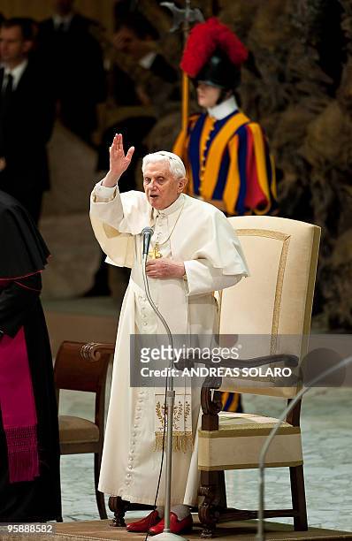 Pope Benedict XVI blesses the faithful gathered in Aula Paolo VI square at the Vatican during his weekly general audience on January 20, 2010 . AFP...