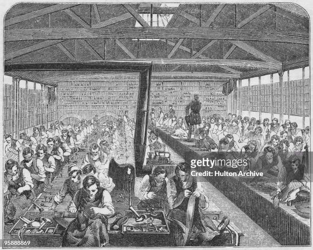 The tailors' and shoemakers' room at Coldbath Fields Prison in London, circa 1850. Prisoners not sentenced to hard labour are given the choice...