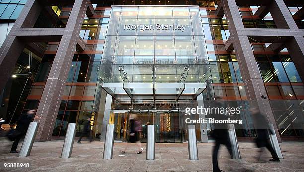 Pedestrians pass the Morgan Stanley headquarters at Canary Wharf in London, U.K., on Monday, Jan. 18, 2010. Bank of America Merrill Lynch is helping...