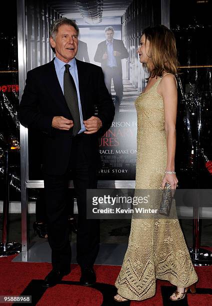 Actor/executive producer Harrison Ford and fiancee Calista Flockhart arrive at the premiere of CBS Films' "Extraordinary Measures" at the Chinese...