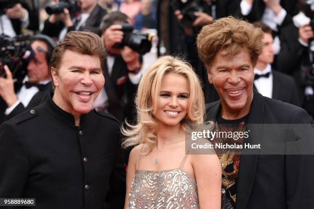 Grichka Bogdanoff, Julie Jardon and Igor Bogdanoff attend the screening of "Solo: A Star Wars Story" during the 71st annual Cannes Film Festival at...