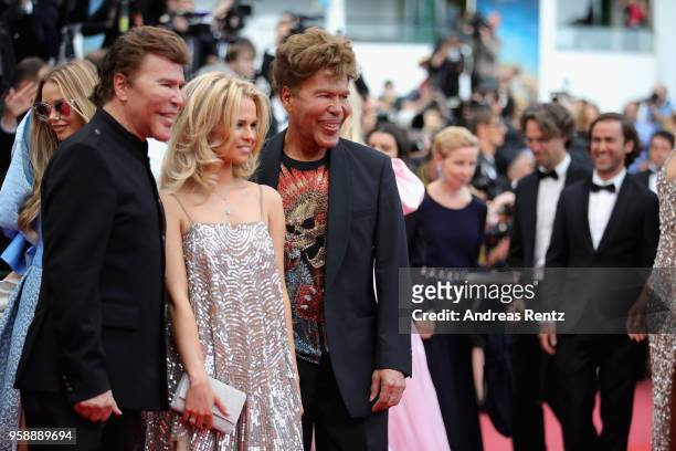 Grichka Bogdanoff, Julie Jardon and Igor Bogdanoff attend the screening of "Solo: A Star Wars Story" during the 71st annual Cannes Film Festival at...
