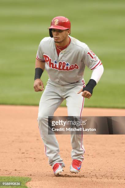Pedro Florimon of the Philadelphia Phillies leads off first base during a baseball game against the Washington Nationals at Nationals Park on May 6,...