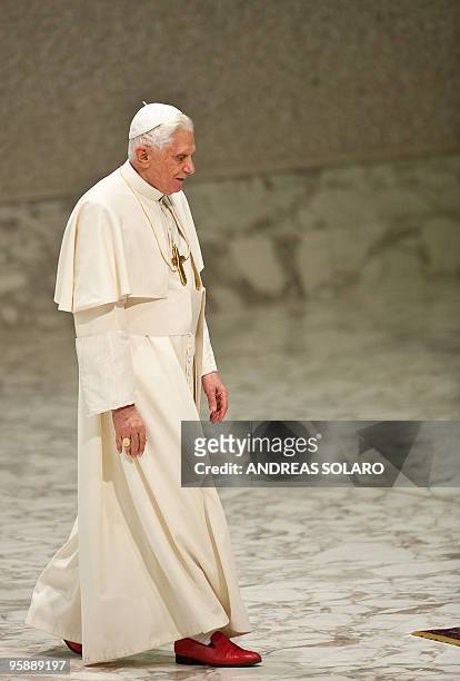 Pope Benedict XVI arrives for his weekly general audience in Aula PaoloVI at the Vatican on January 20, 2010 . AFP PHOTO / ANDREAS SOLARO