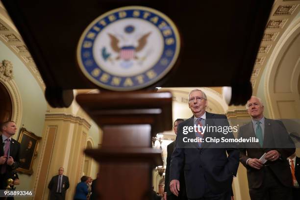 Senate Majority Leader Mitch McConnell and Senate Majority Whip John Cornyn prepare to talk to reporters following the weekly Senate Republican...