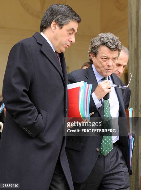 Prime Minister Francois Fillon and Ecology, Energy and Sustainable Development and Climate Negotiations State Minister Jean-Louis Borloo the leave...