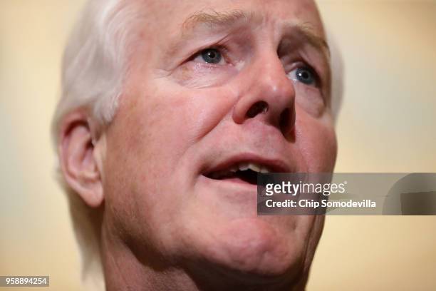 Senate Majority Whip John Cornyn talks to reporters following the weekly Senate Republican policy luncheon at the U.S. Capitol May 15, 2018 in...