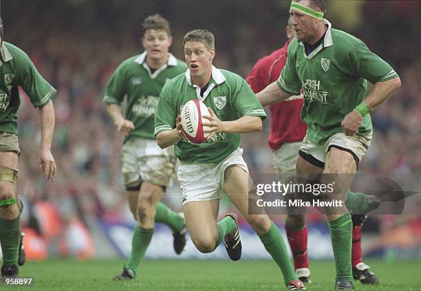 Ronan O''Gara of Ireland runs with the ball during the Six Nations Championship match between Wales and Ireland played at the Millennium Stadium in...